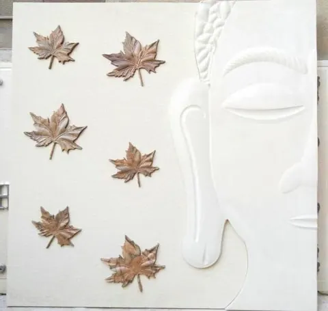Buddha Profile and Falling Leaves Stone Mural — OS-SM-042